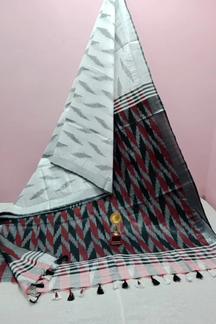 white handwoven ikat cotton saree - linenworldonline.in