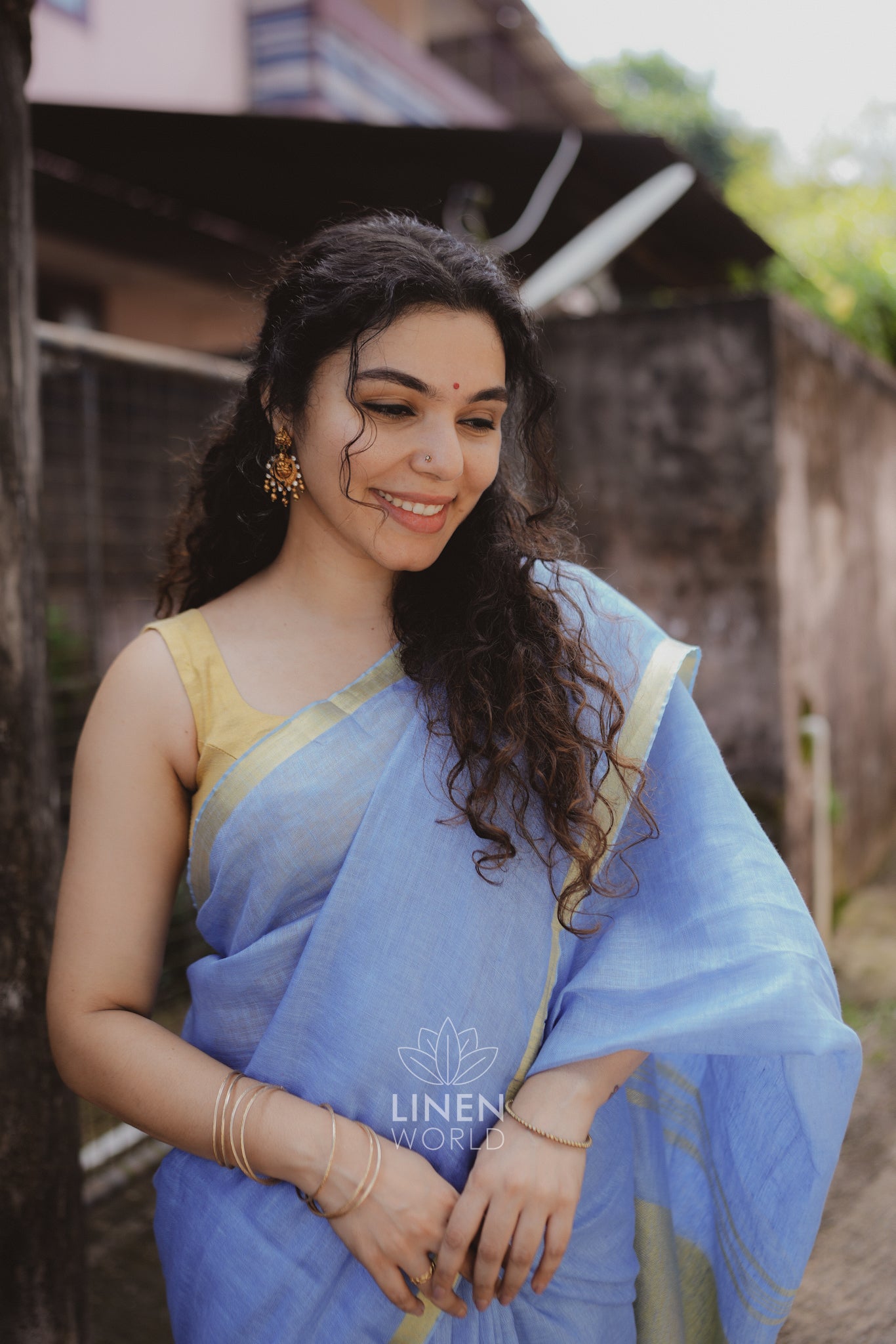 tanishka: blue gold zari pure handwoven linen saree - linen world