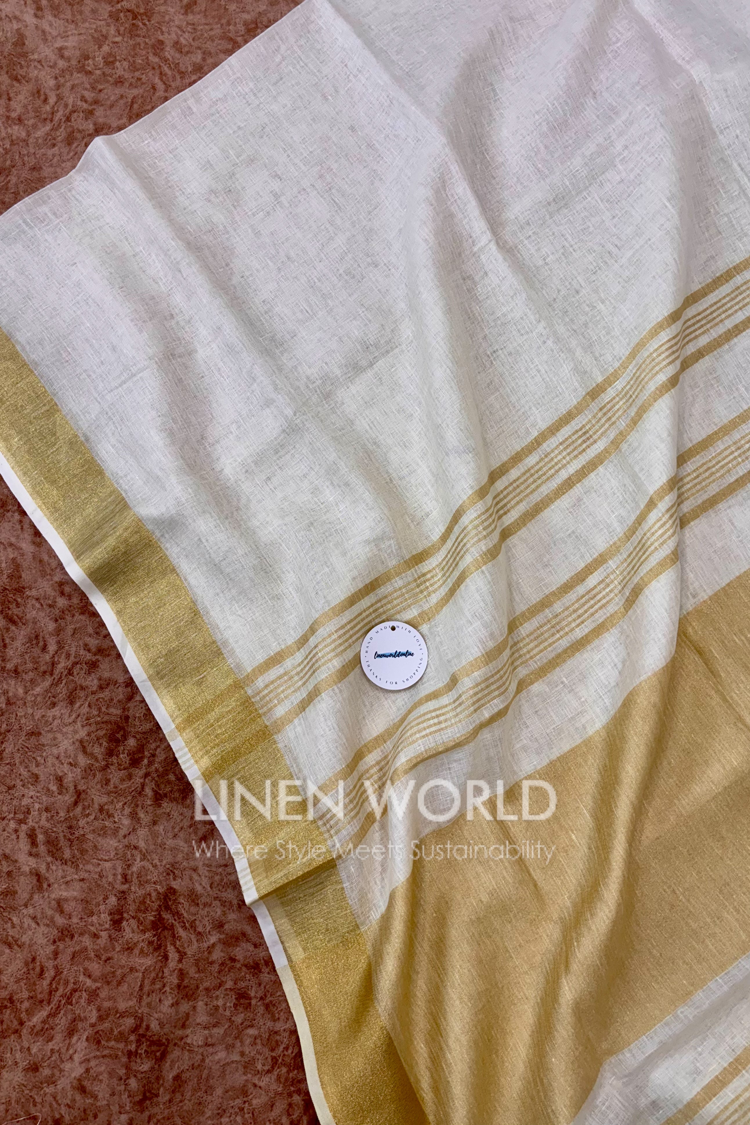 onam special cream linen saree with gold border - linen world