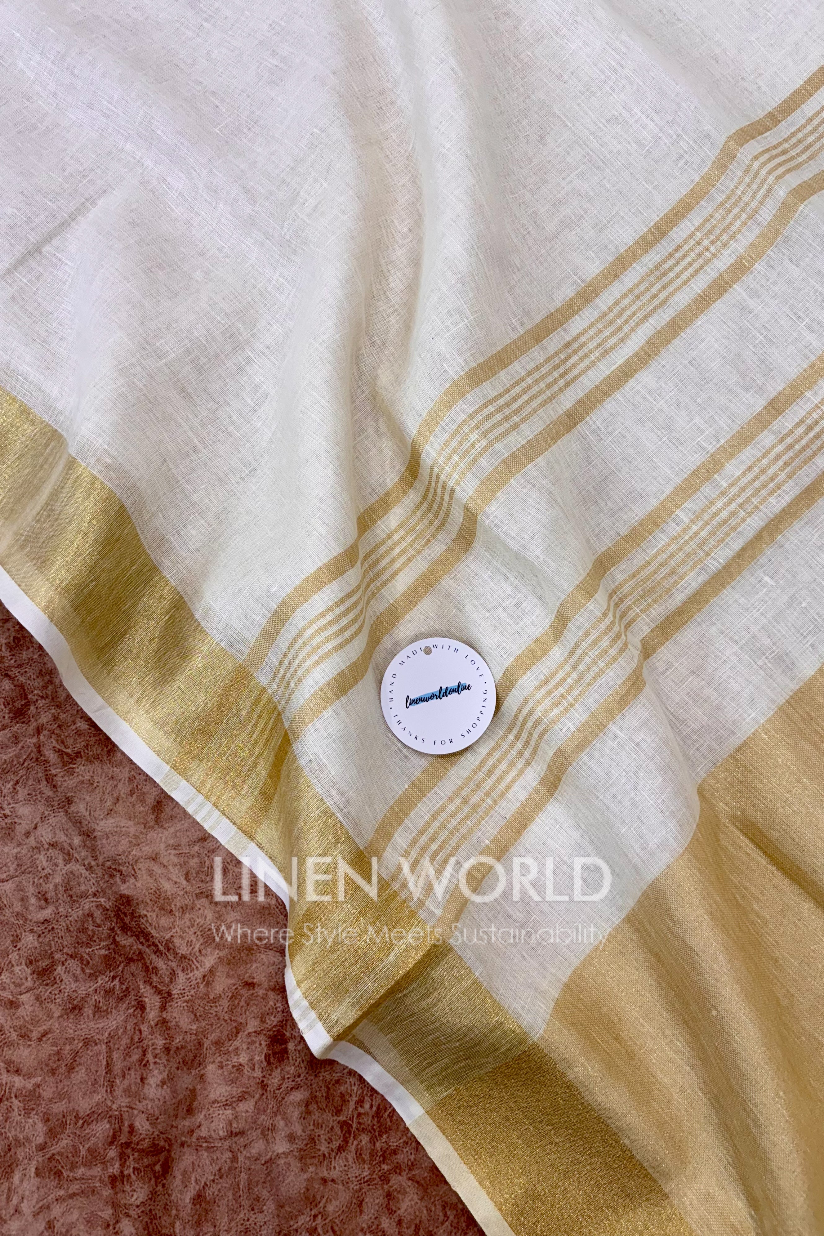 onam special cream linen saree with gold border - linen world