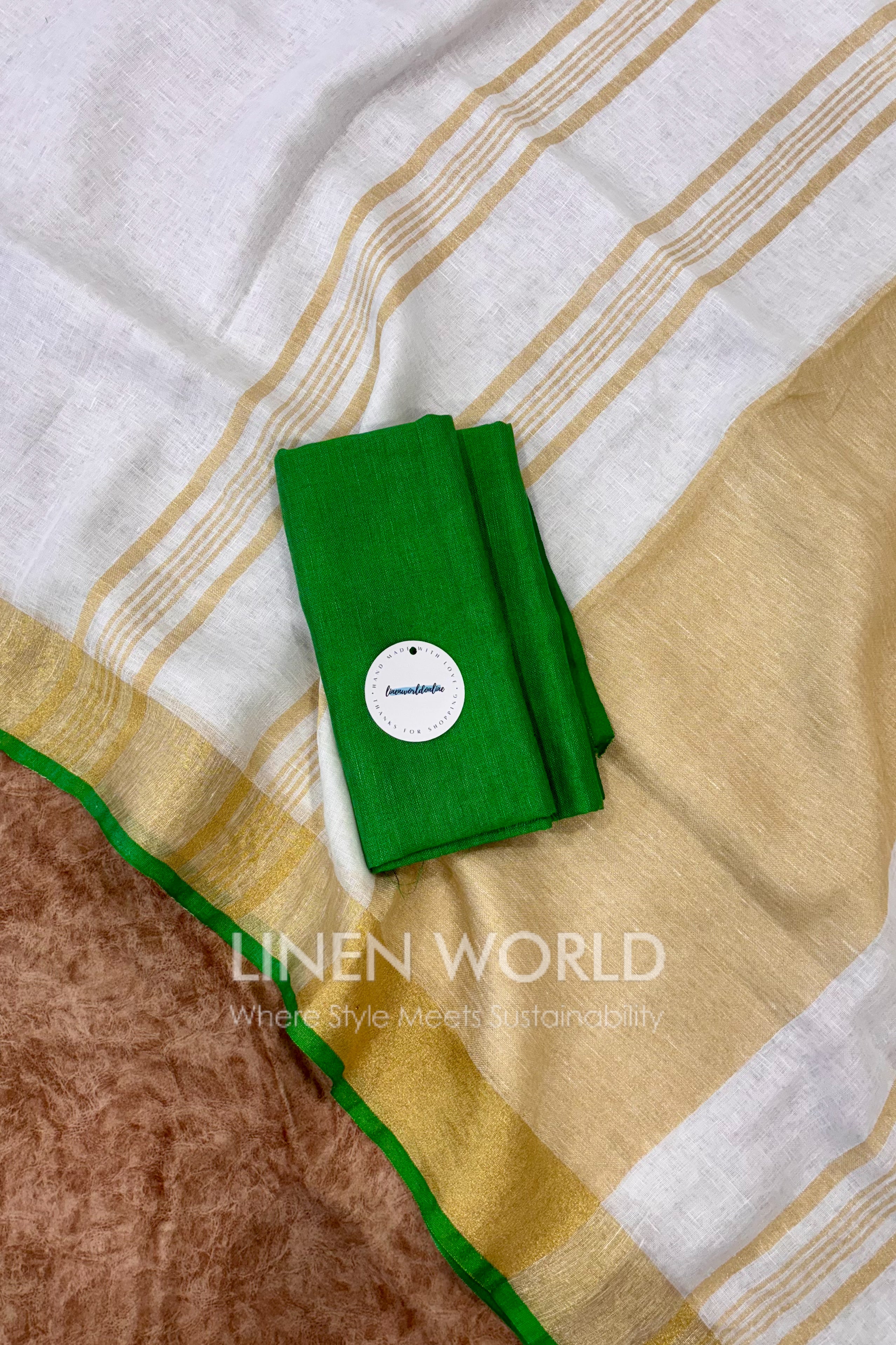 white pure linen saree with green border - linen world