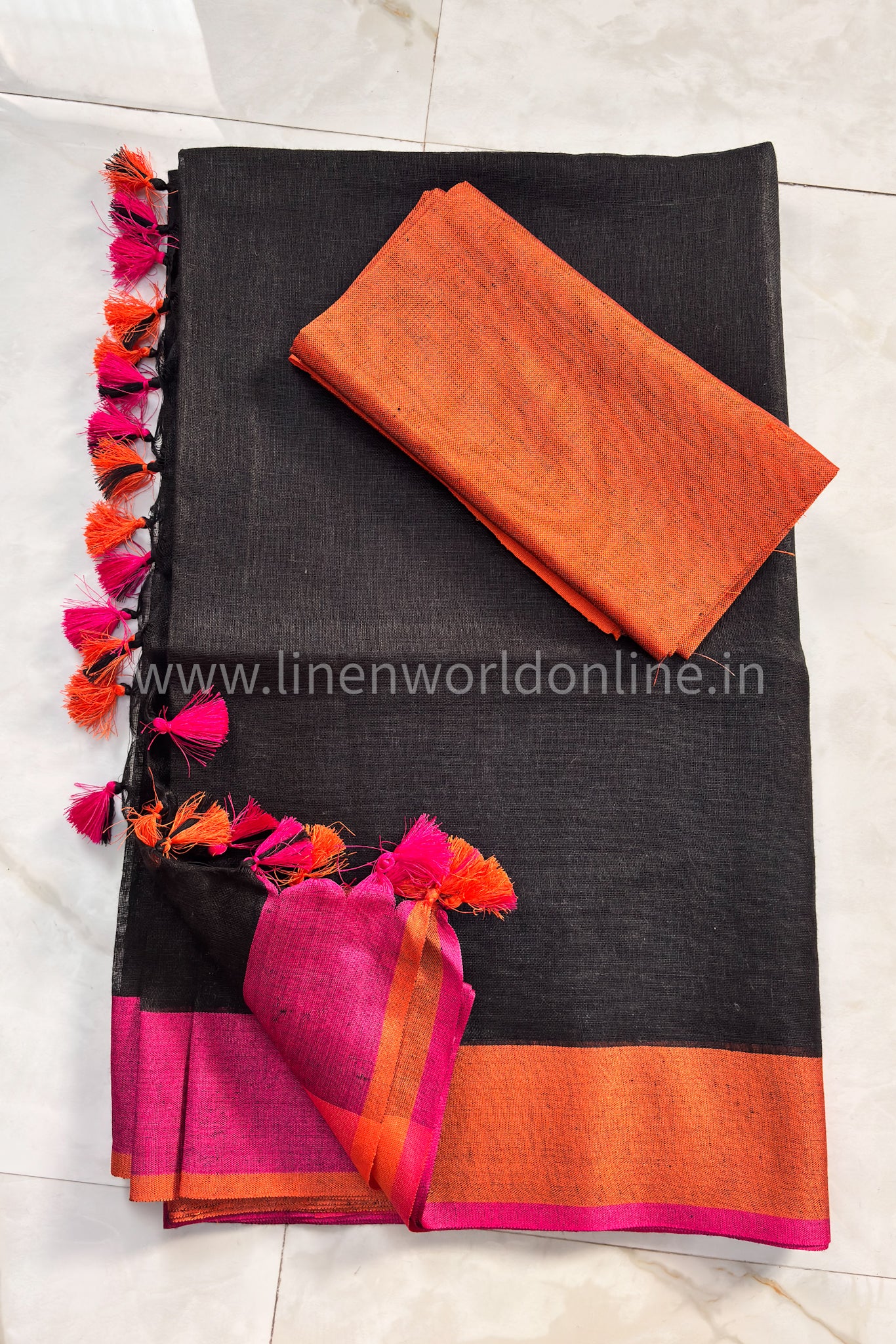 jet black handloom pure linen saree with pink and orange border and tassels - linenworldonline.in