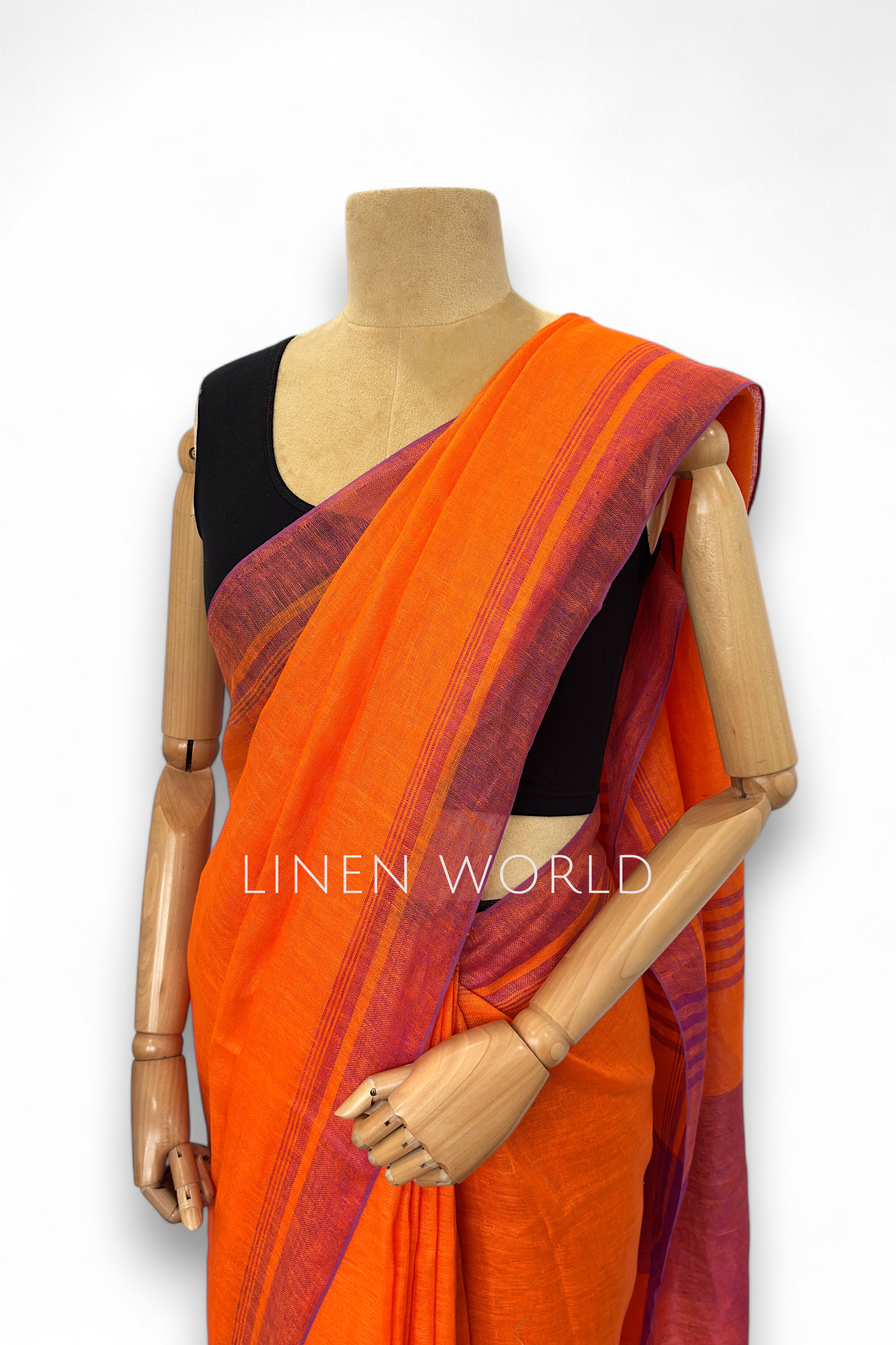 Elegant dark orange linen saree designed for both work and casual wear.