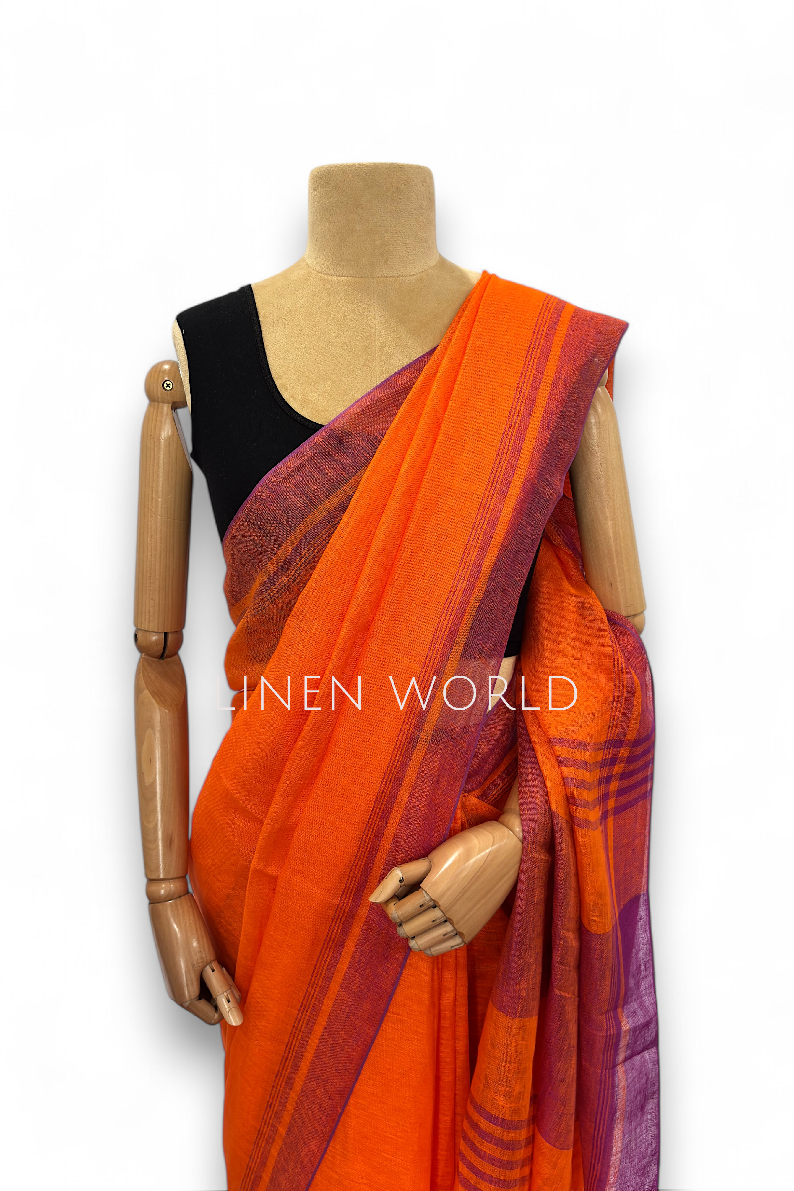 Dark orange linen saree with subtle border, stylish and comfortable to wear.