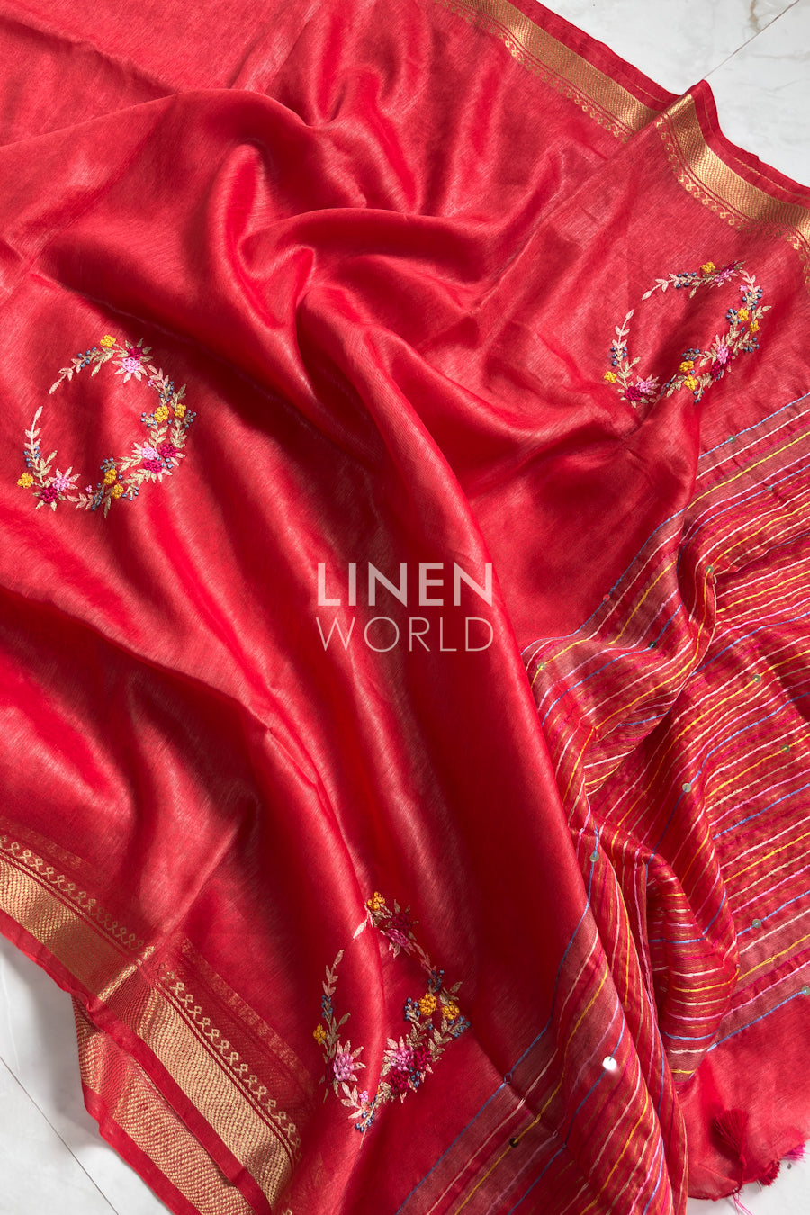 Elegant red silk linen saree with handmade French knot work