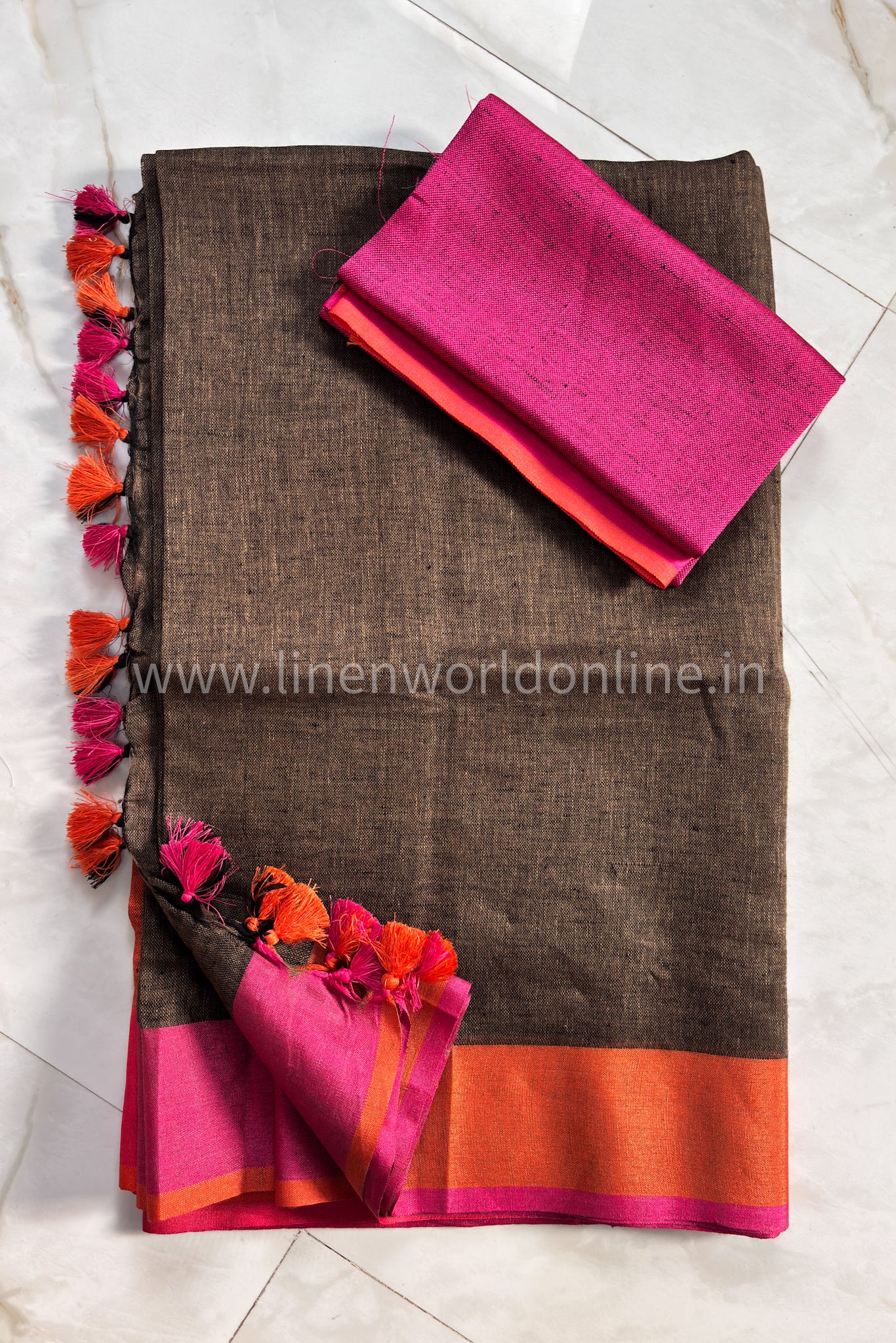 handloom brown pure linen saree with pink and orange border and tassels - linenworldonline.in