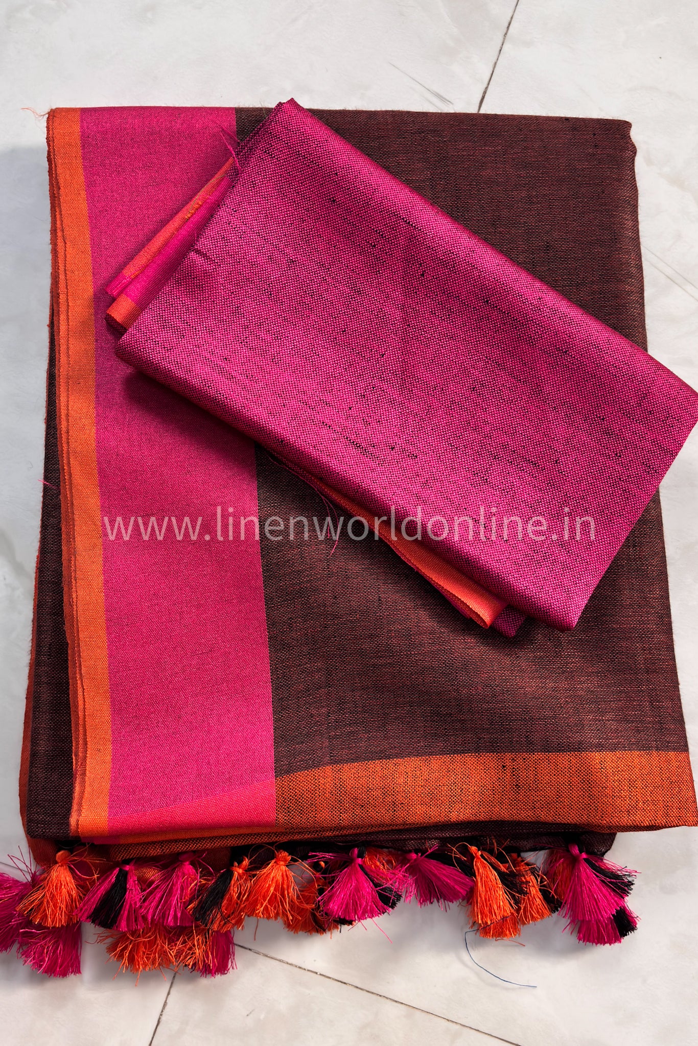 rust pure linenhandloom saree with pink and orange border and tassels - linenworldonline.in