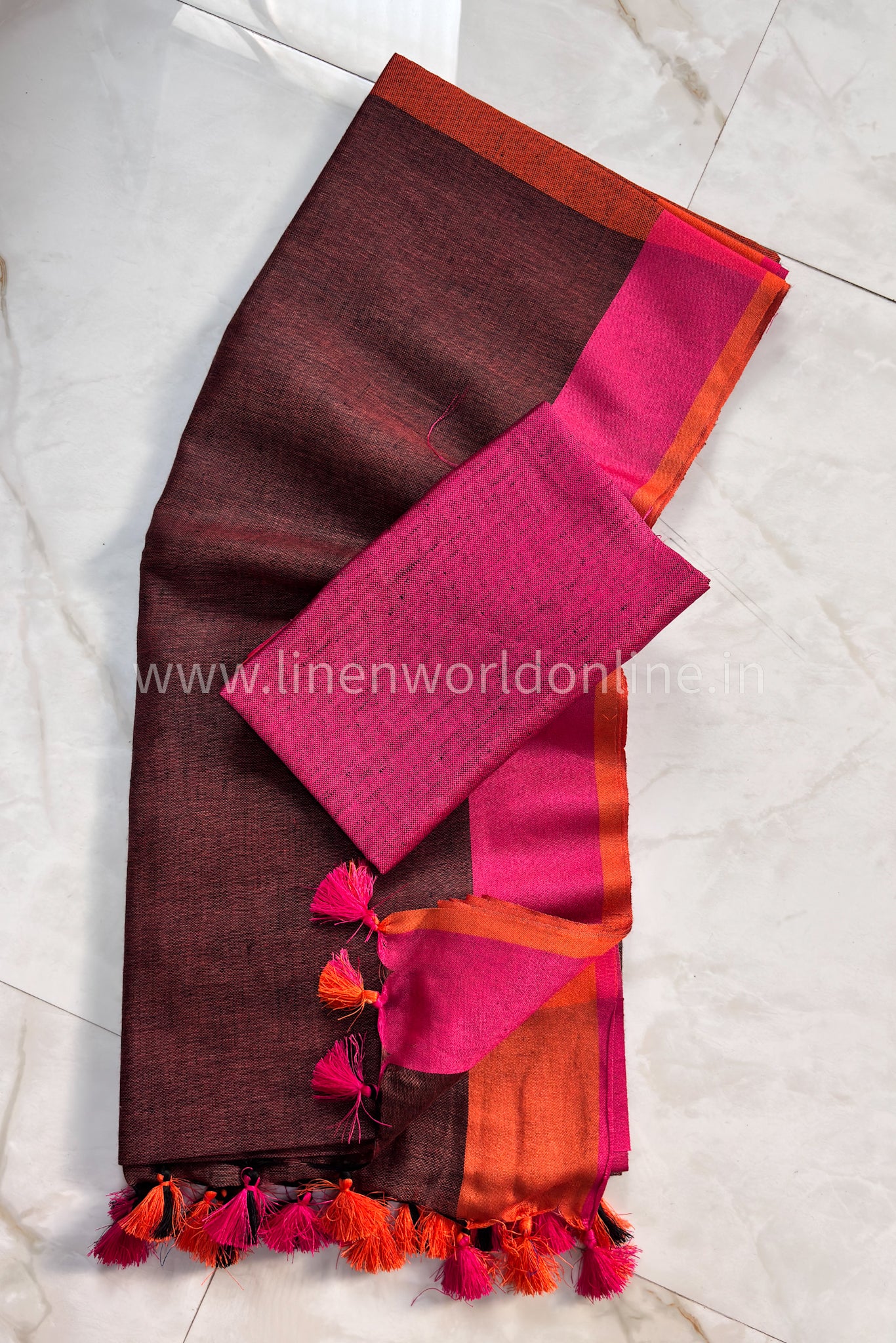 handloom rust pure linen saree with pink and orange border and tassels - linenworldonline.in