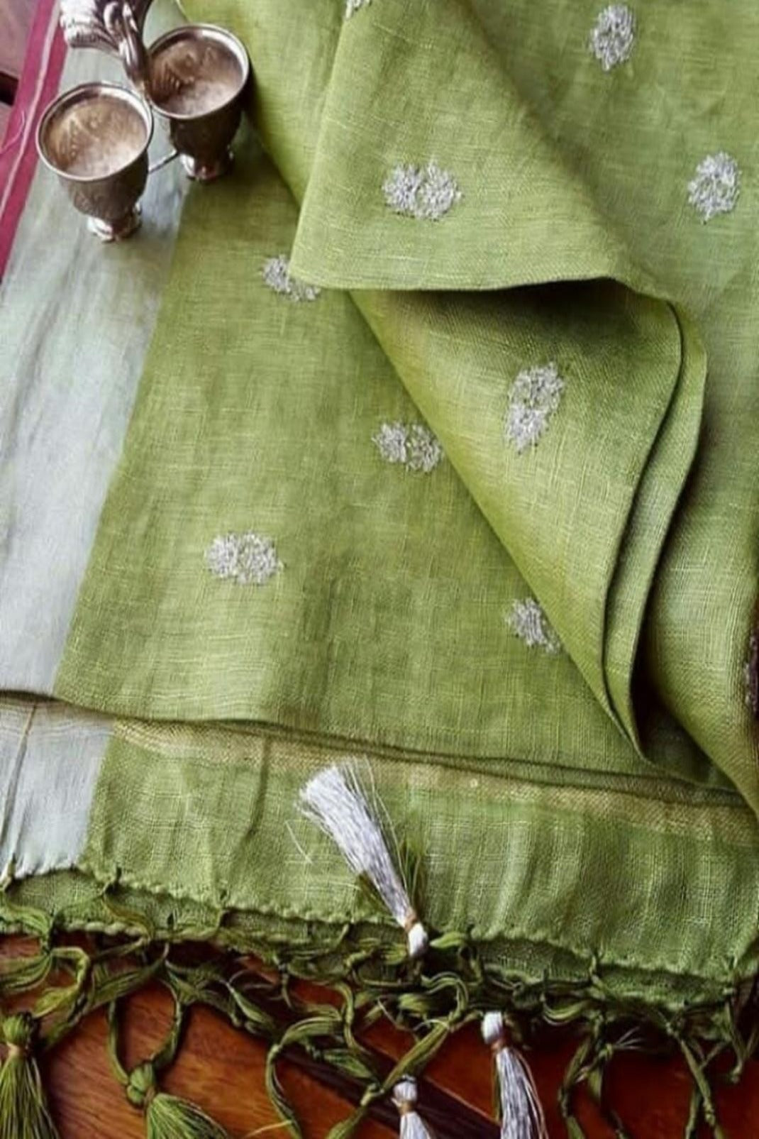 avocado green embroidered handloom pure linen saree - linenworldonline.in