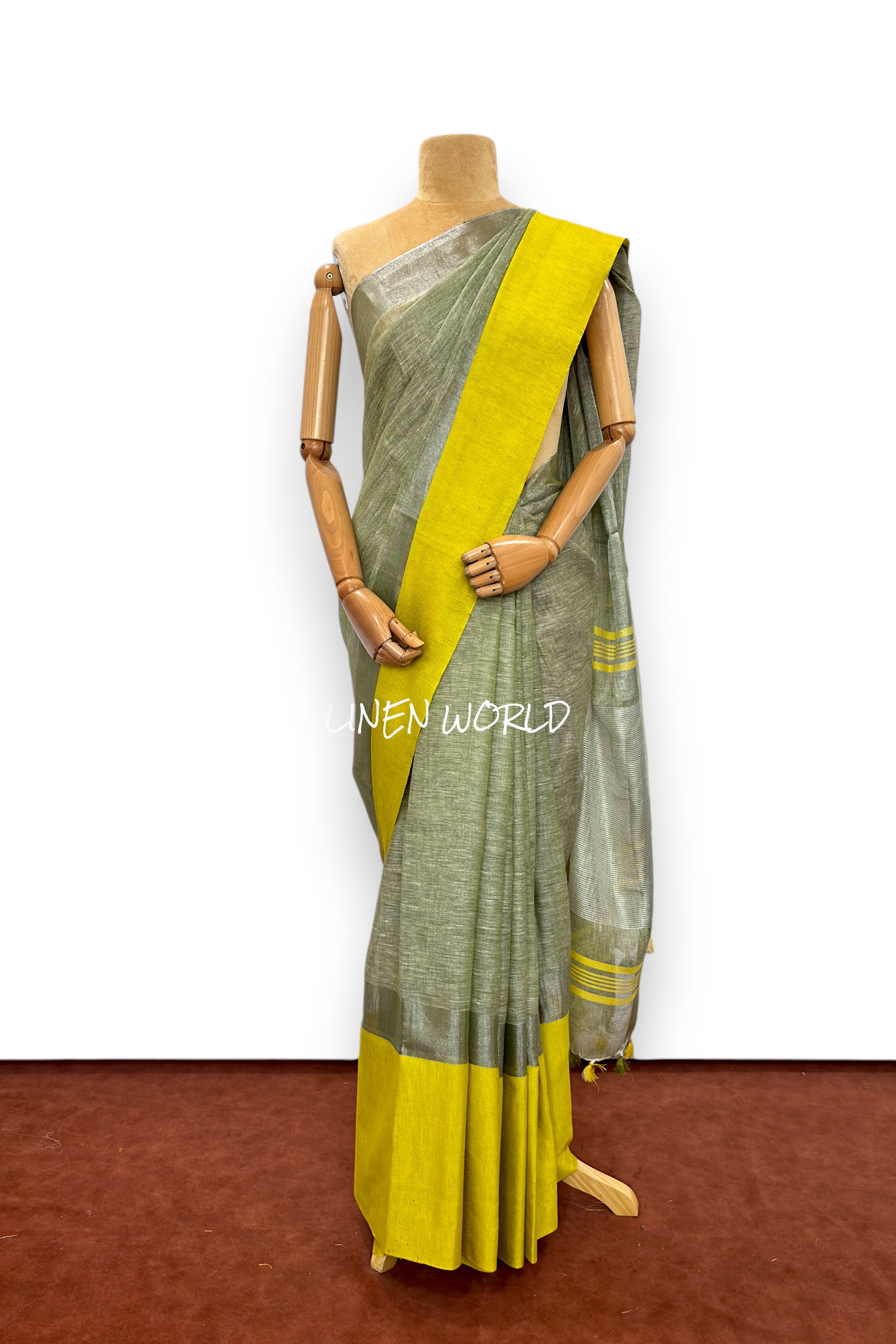 Darshini Blue linen saree with broad yellow border by Linen World