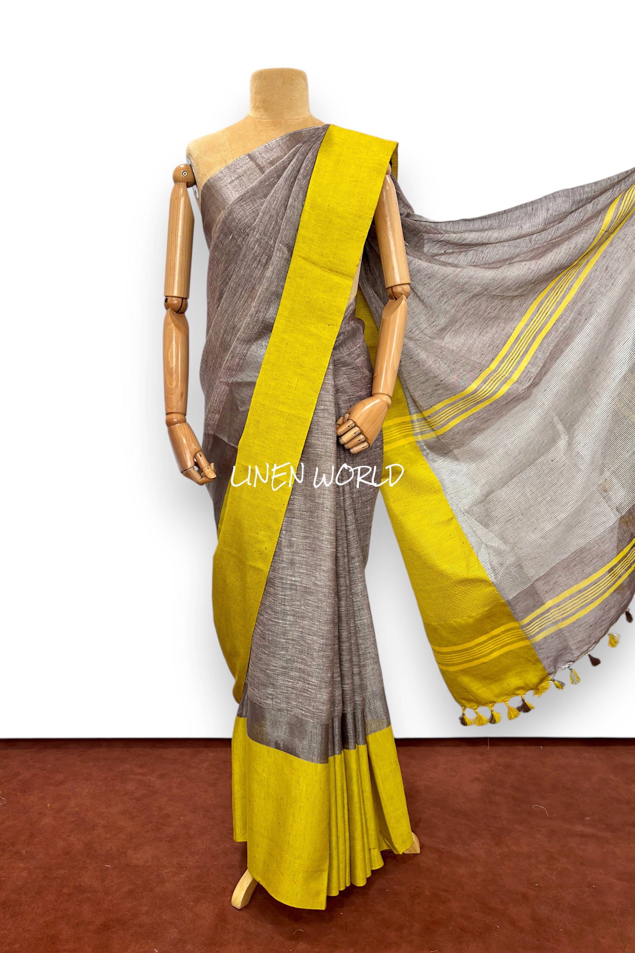 Darshini brown linen saree showcasing fine weaving details by Linen World
