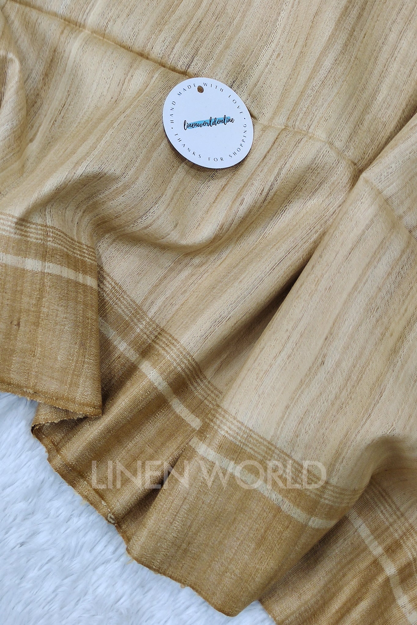 brown border tussar ghicha silk saree - linenworldonline.in