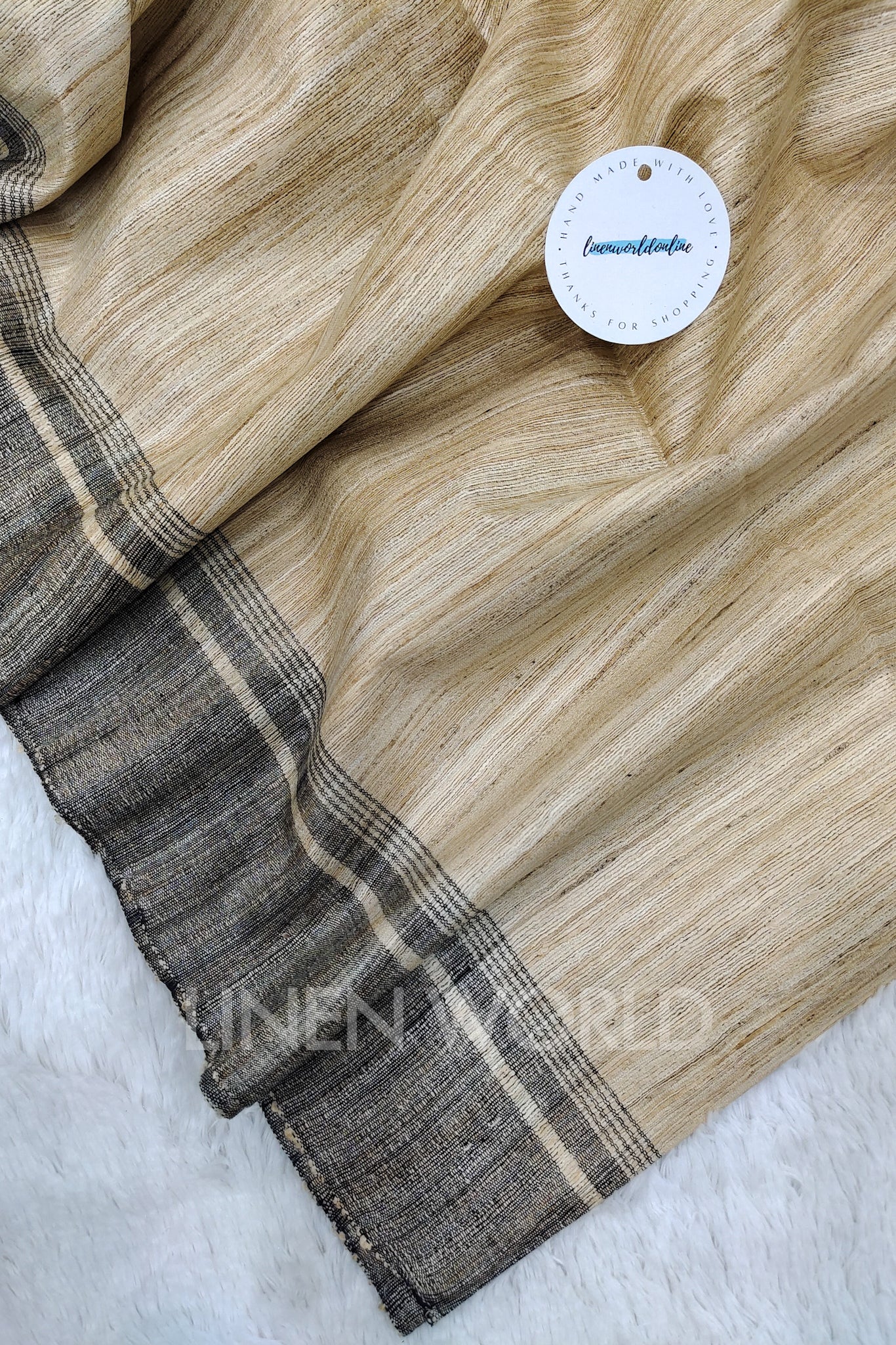 black border tussar ghicha silk saree - linenworldonline.in