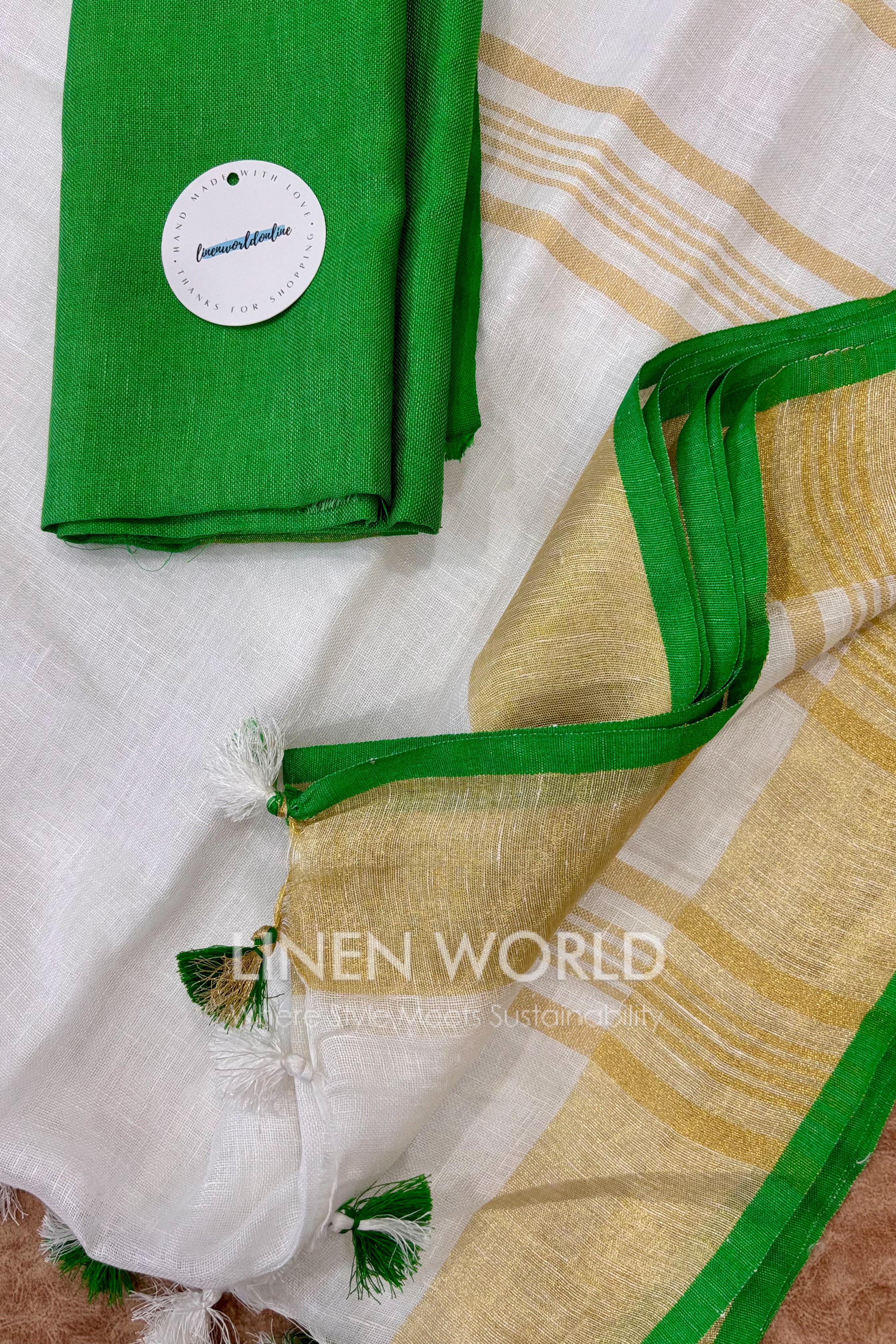white pure linen saree with green border - linen world