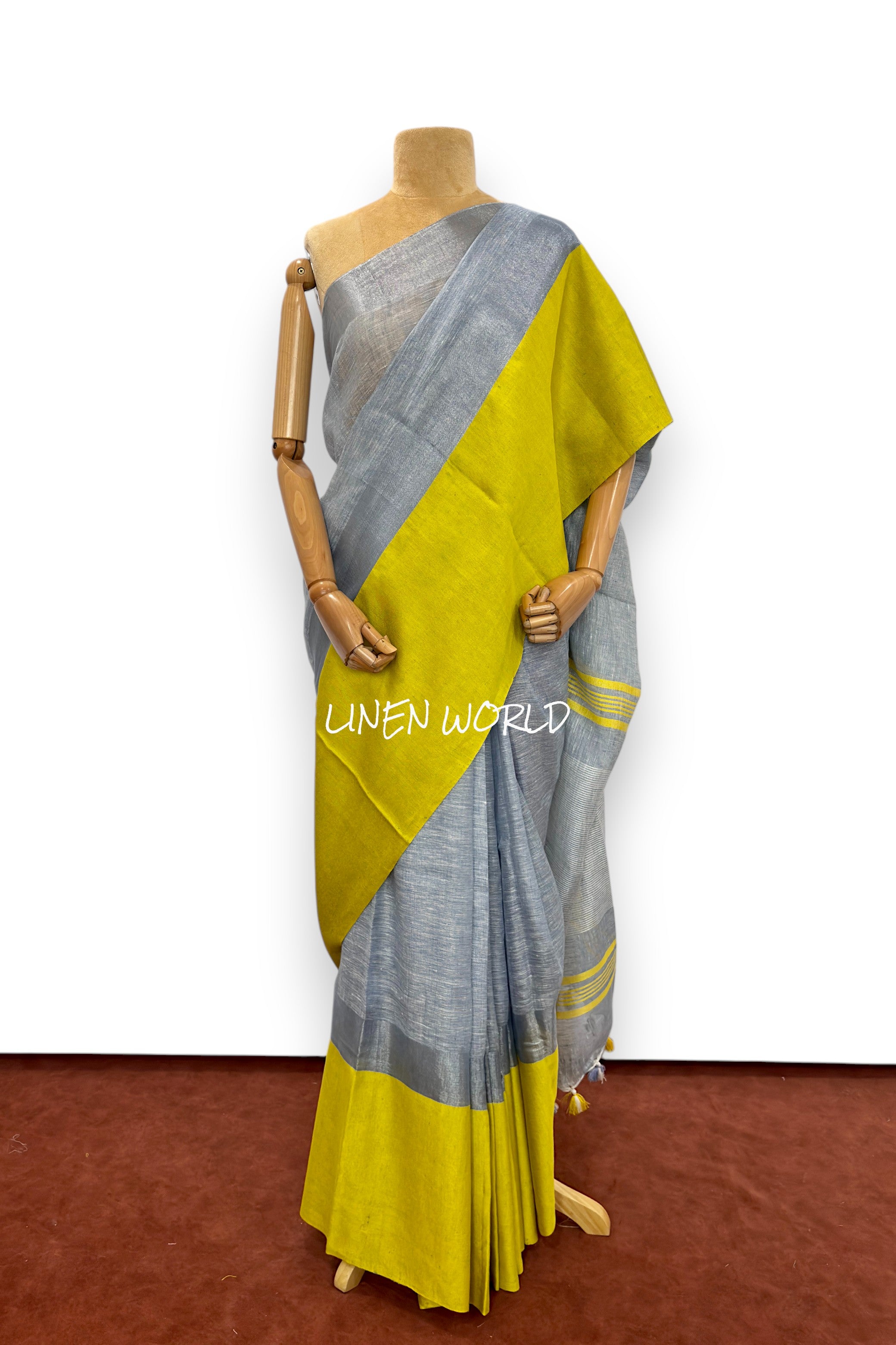 Darshini blue linen saree showcasing fine weaving details by Linen World