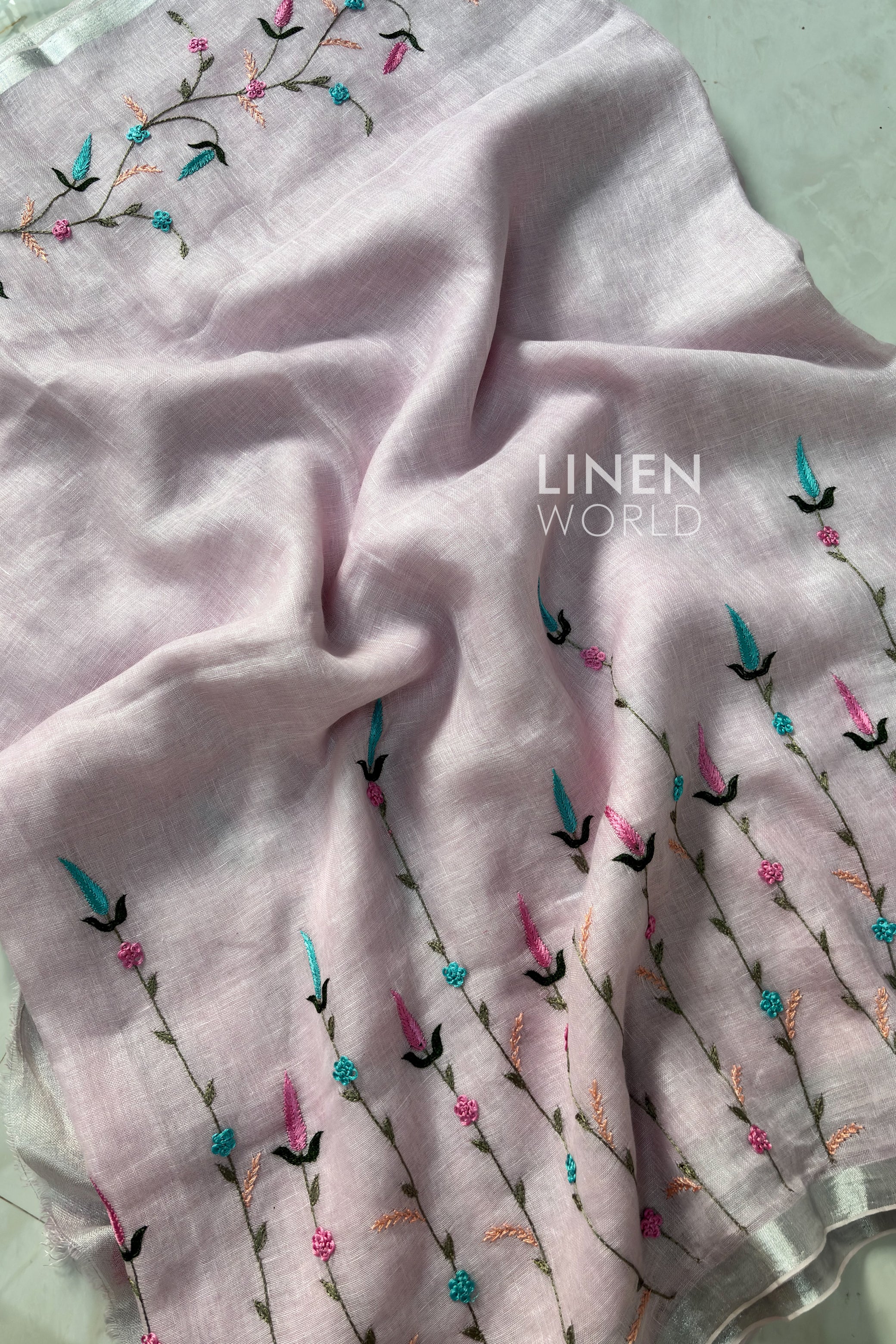 Hand-made French knot work close-up on linen saree by Linen World