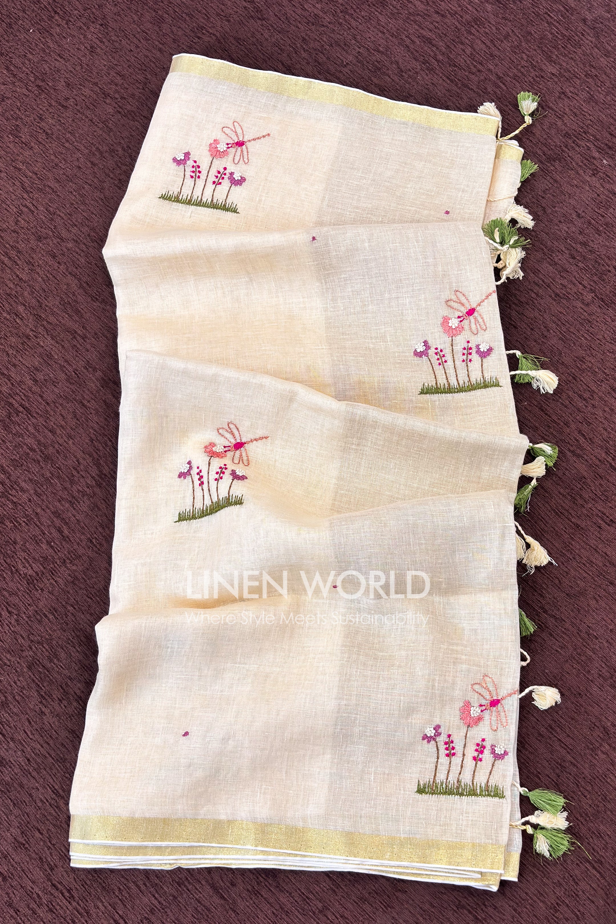 Pure linen saree with hand embroidered dragonfly and floral French knot work, Onam 2026 exclusive by Linen World