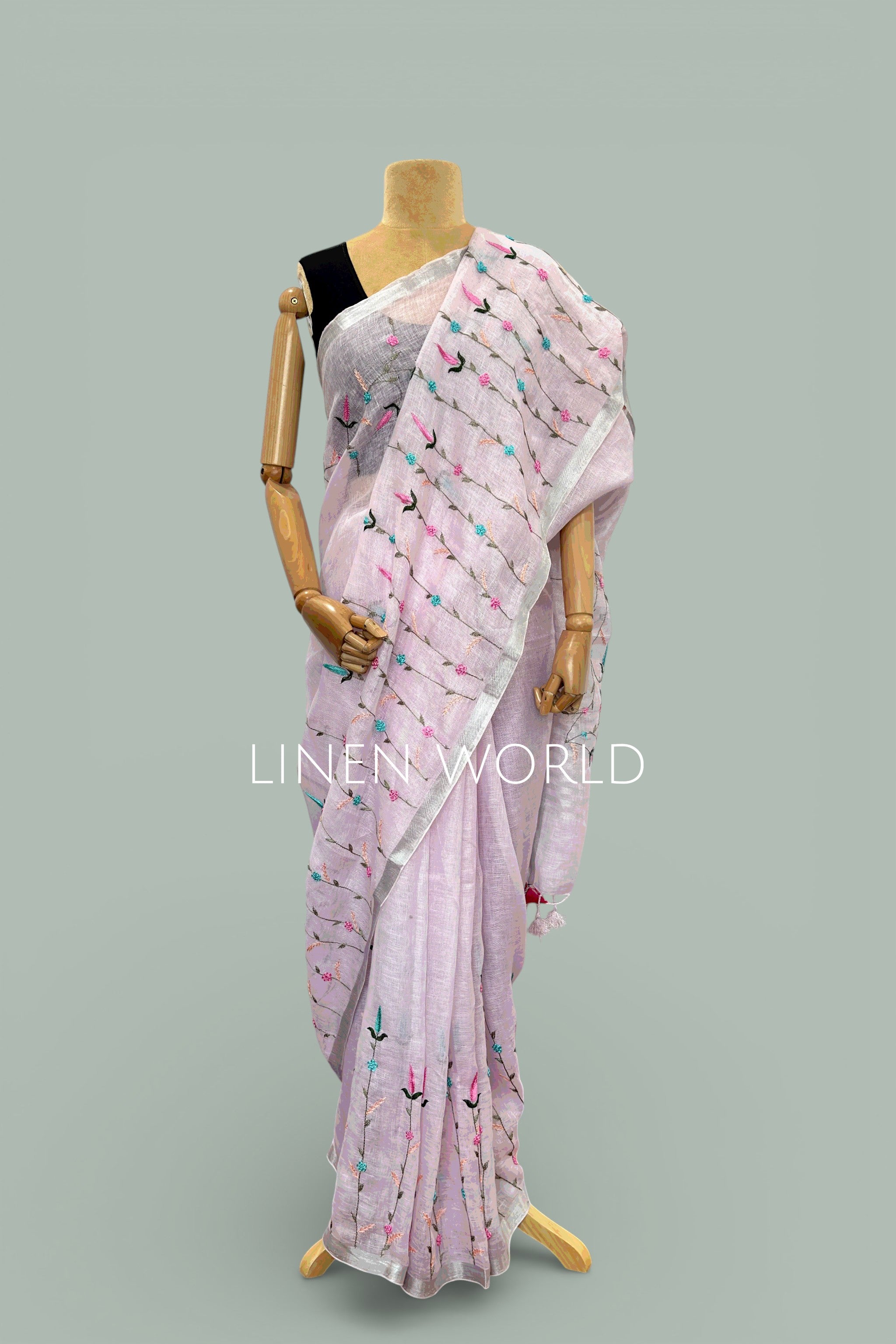 Hand-made French knot work on linen saree by Linen World