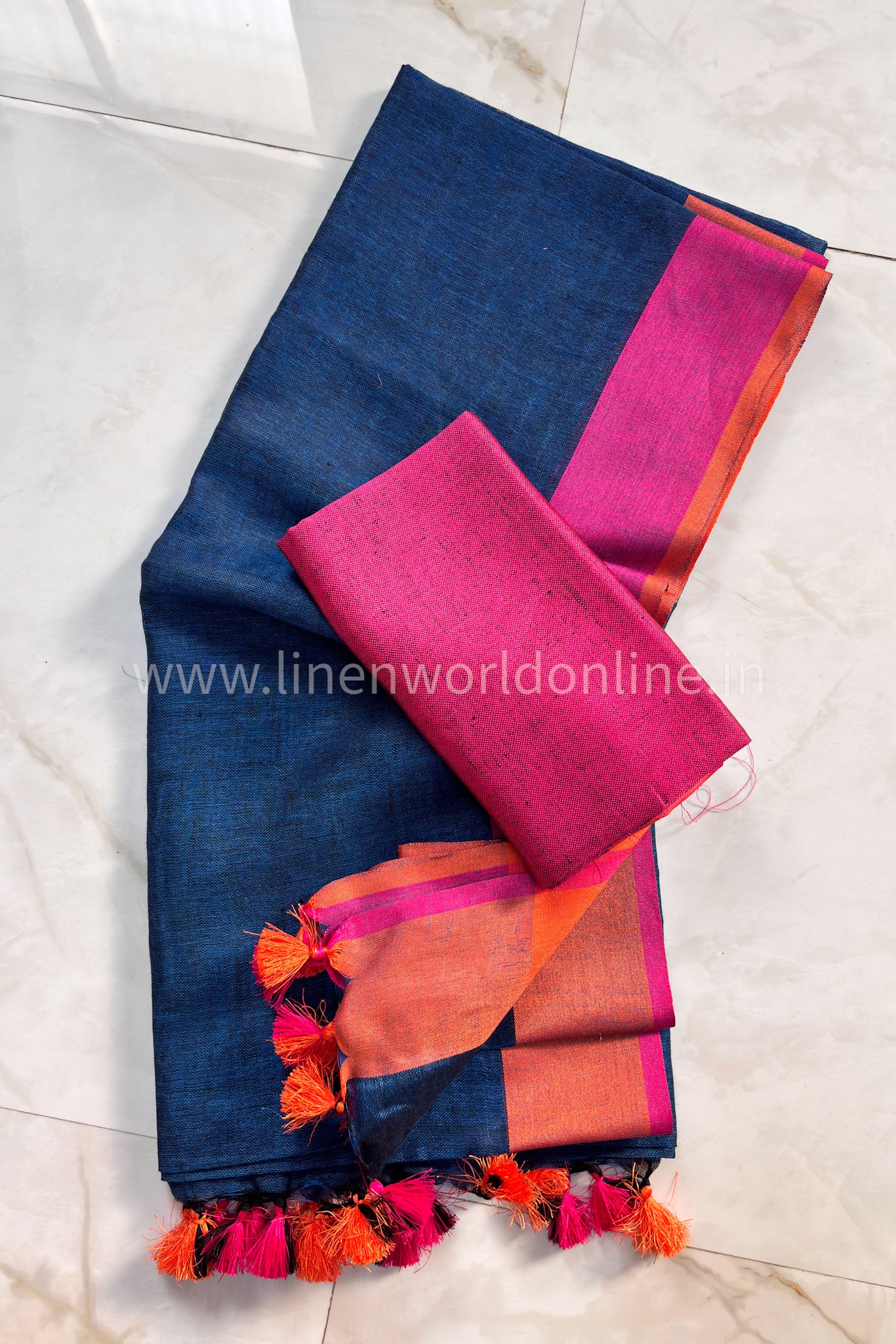 midnight blue handloom pure linen saree with pink and orange border and tassels - linenworldonline.in