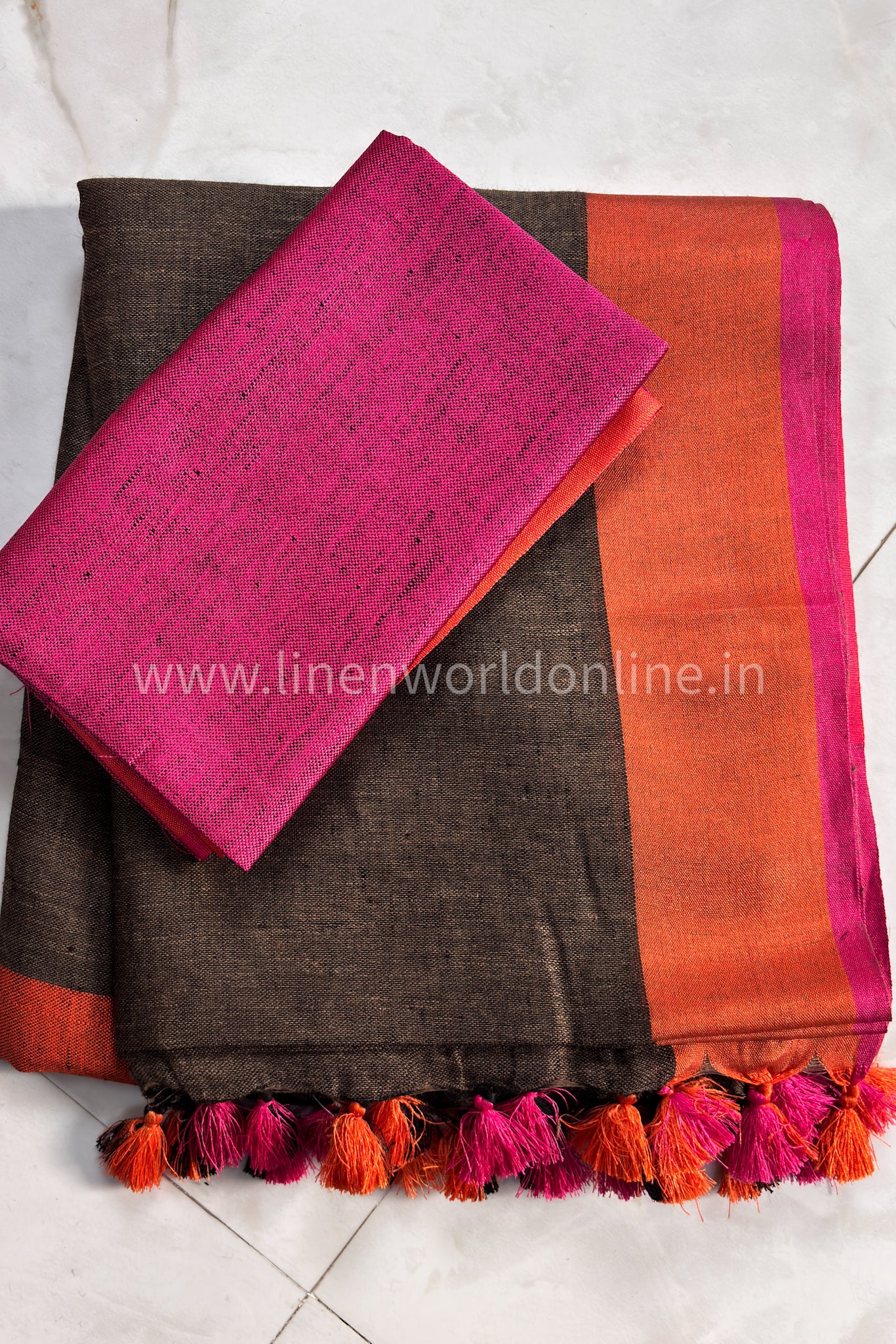handloom brown pure linen saree with pink and orange border and tassels - linenworldonline.in