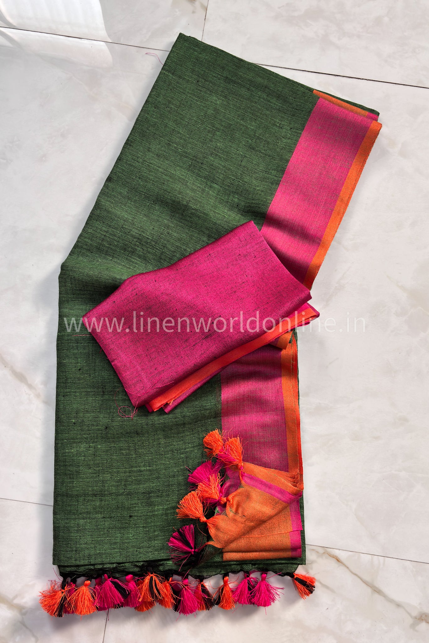 forest green handloom pure linen saree with pink and orange border and tassels - linenworldonline.in