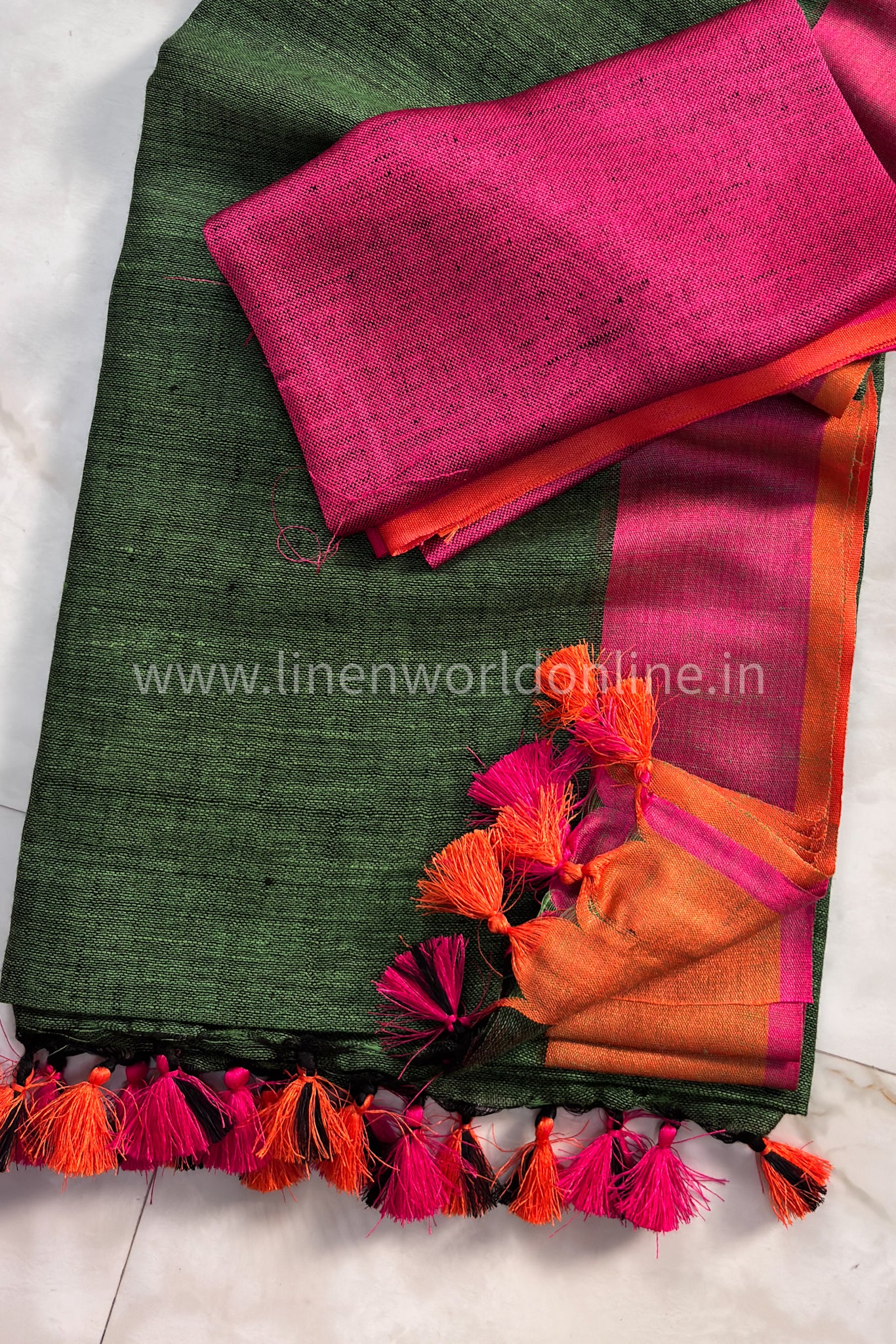 forest green handloom pure linen saree with pink and orange border and tassels - linenworldonline.in
