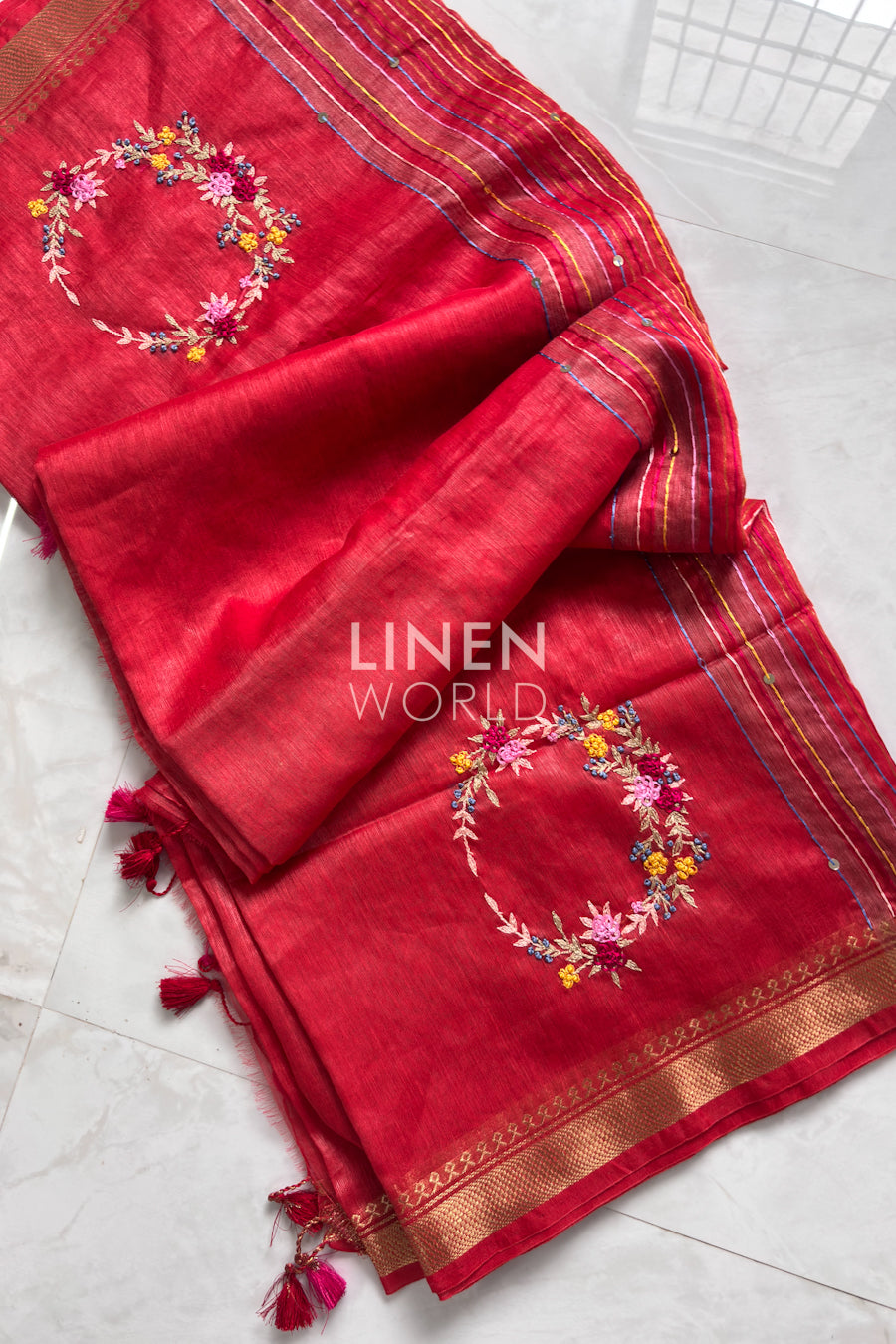 Handcrafted red linen silk saree with French knot embroidery