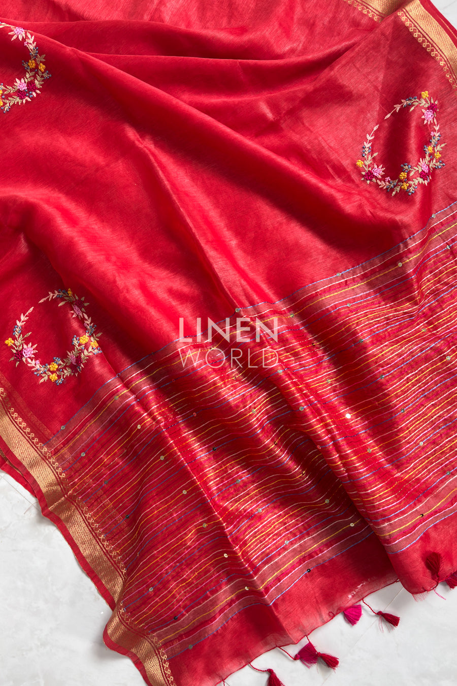 Luxury red hand embroidered French knot silk linen saree from Linen World