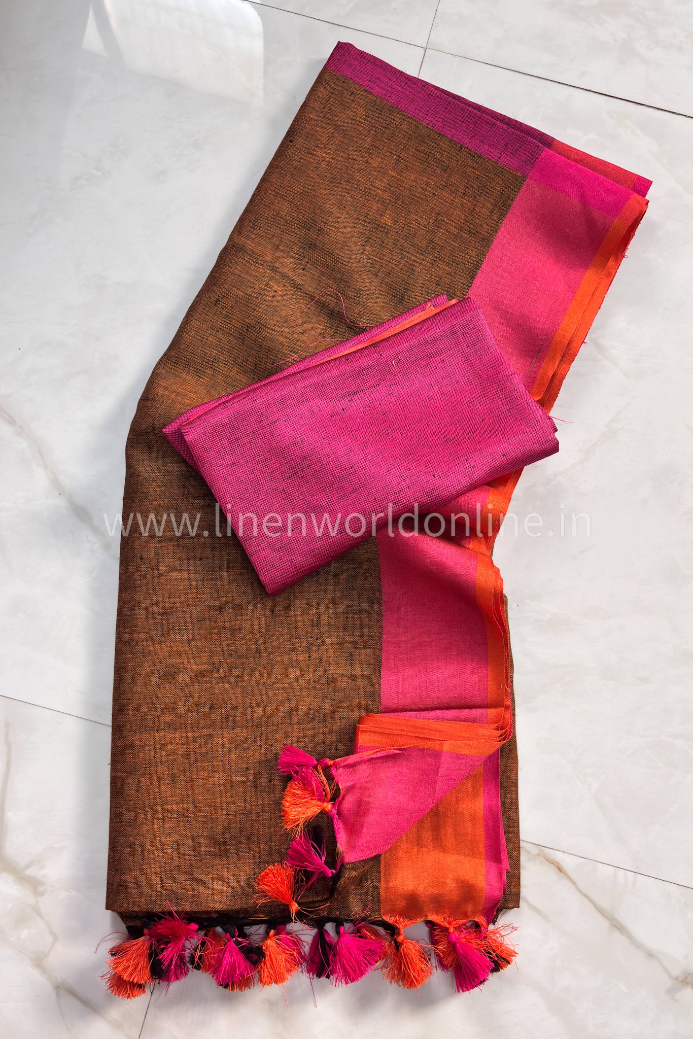 handloom mocha organic linen saree with pink and orange border and tassels - linenworldonline.in
