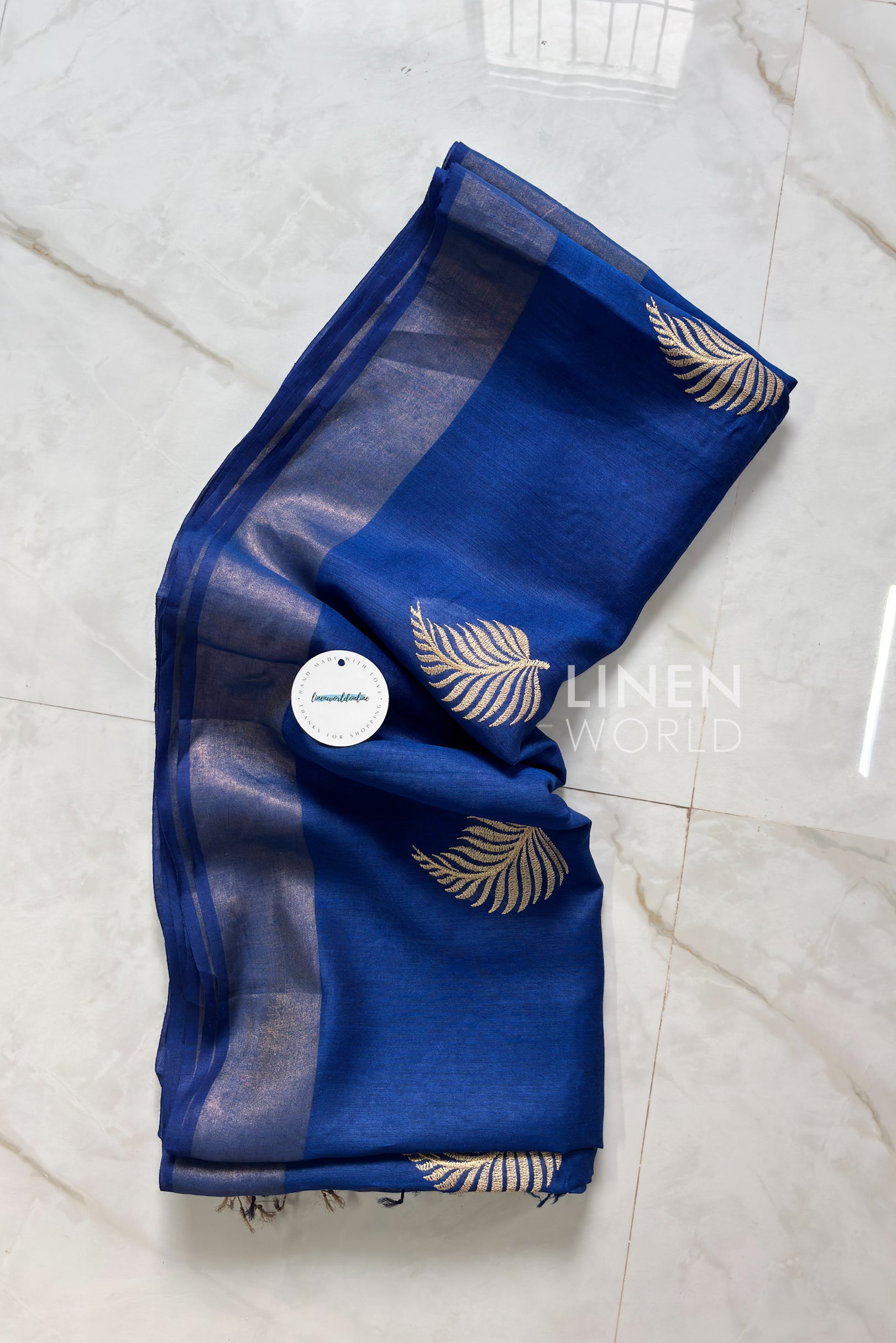 Royal Blue Muga Silk Saree with digital leaf embroidery by Linen World