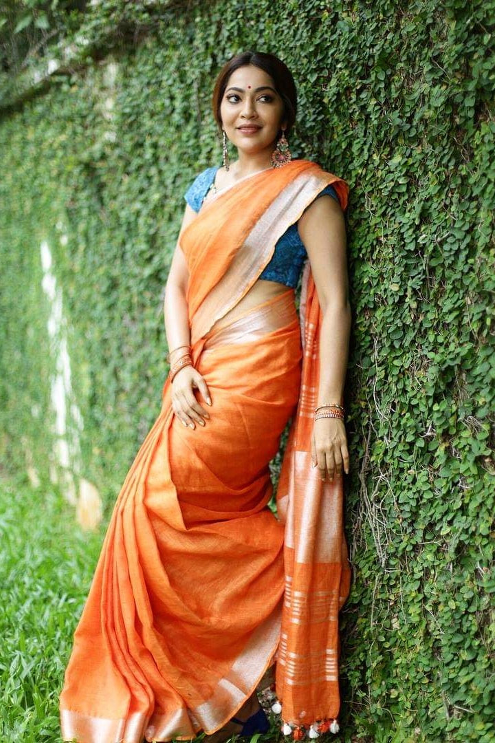ramya in orange linen saree - linenworldonline.in
